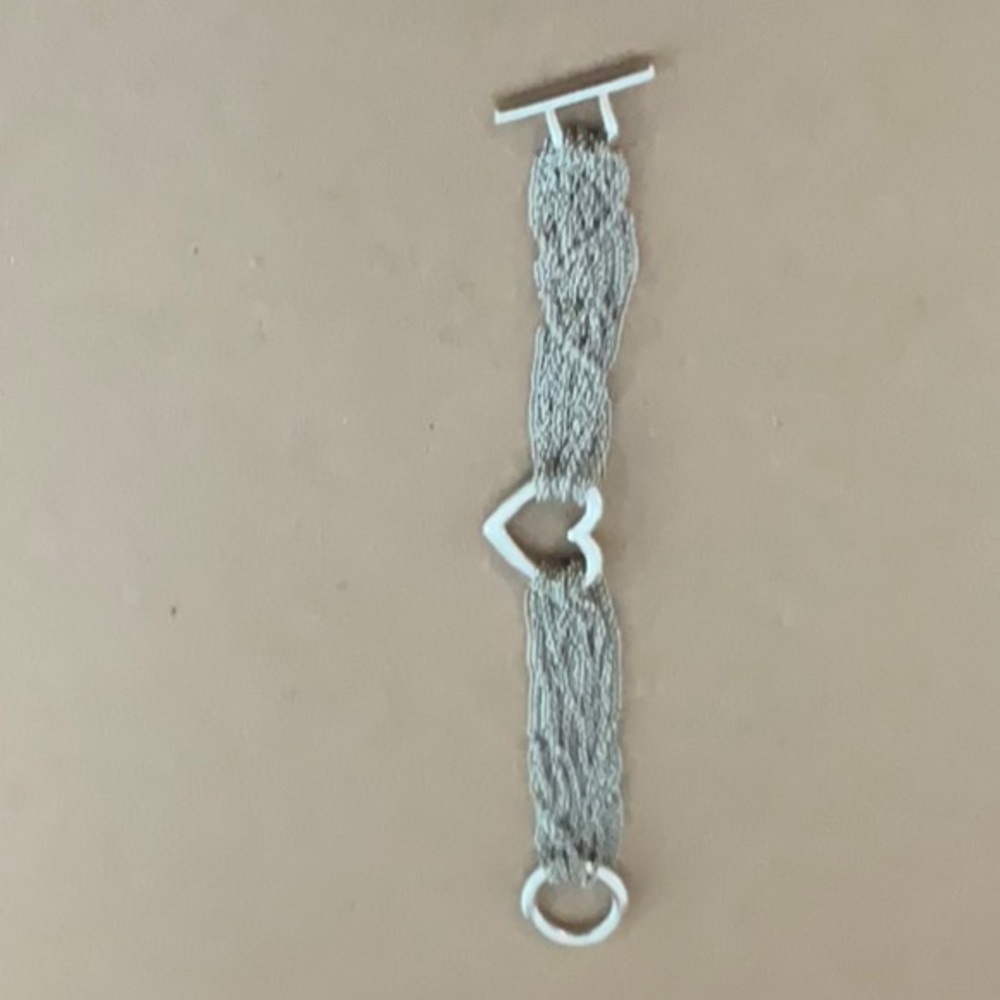 Authentic Tiffany bracelet sterling silver multi chain heart bracelet.